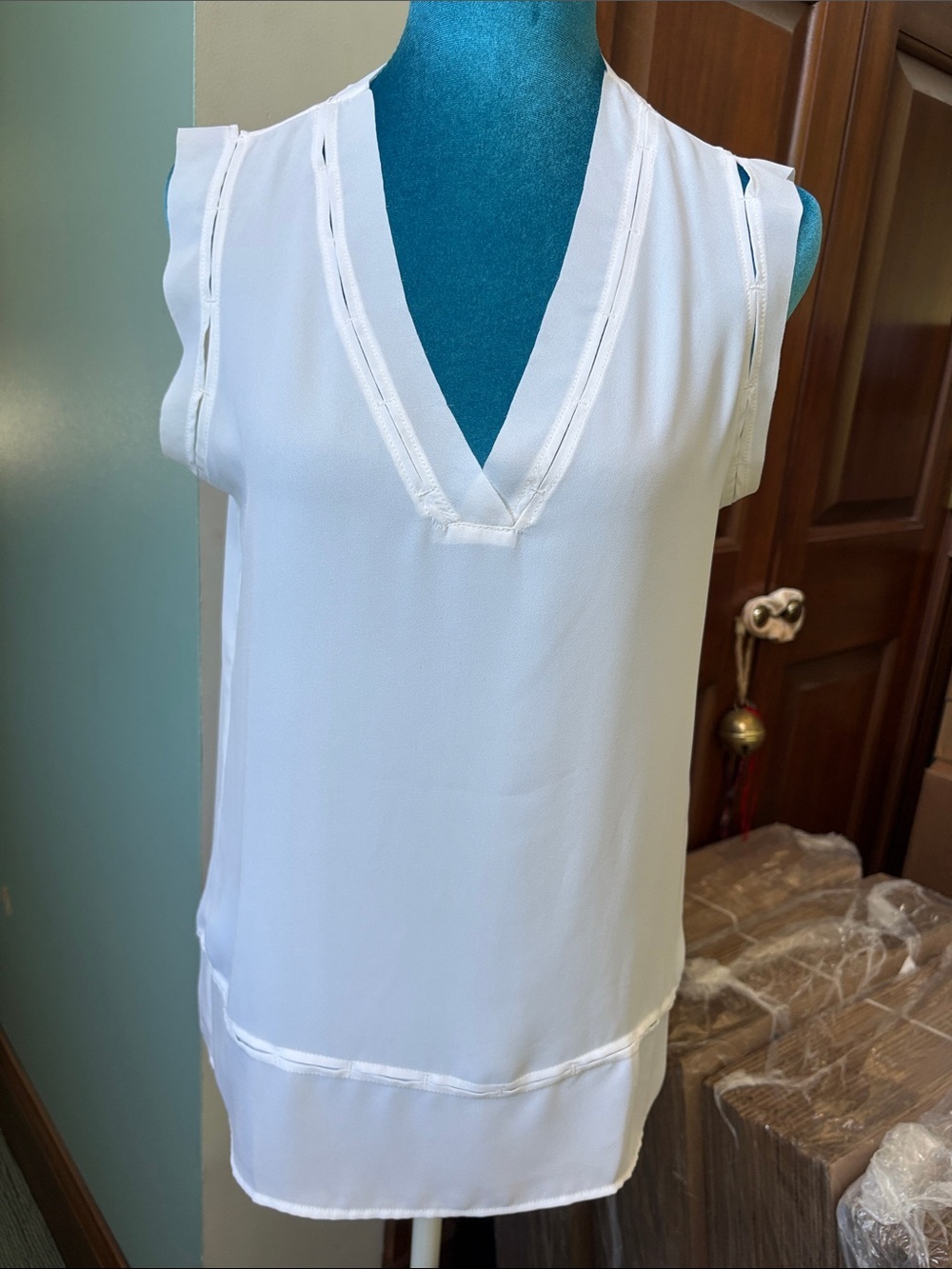 Banana Republic Top White Sleeveless  V-Neck  cut out work on neck arms &bottom